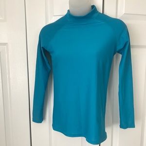 Girl's teal rash guard